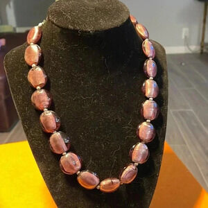 Vintage Italian Murano metallic ovoid flat bead neck.